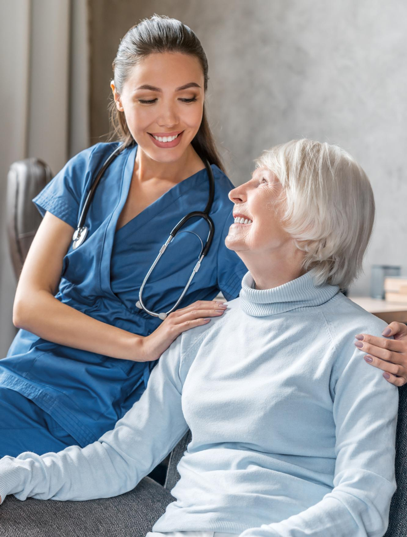 A nurse caring for a senior resident at Adrian Bay Rehab & Nursing Center