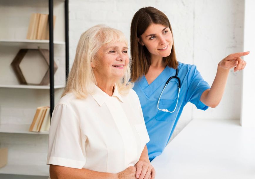 A caring nurse with a senior resident