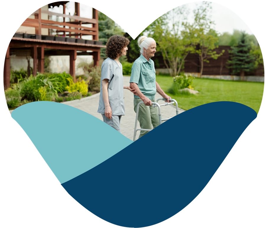 A caregiver and resident at Adrian Bay Rehab & Nursing Center
